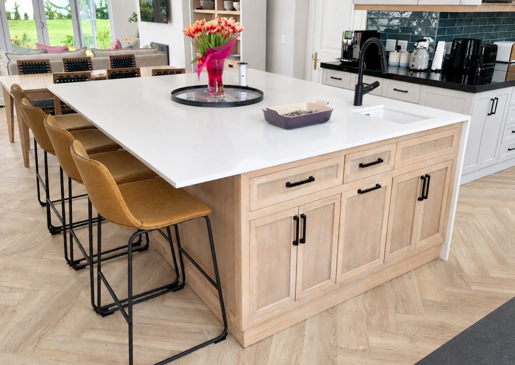 Kitchen island in light oak with white top