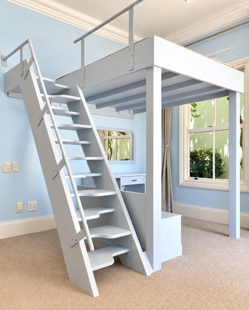 White loft bed with stairs and desk
